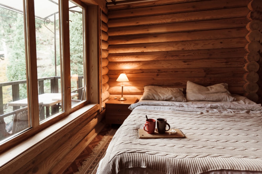 A cozy bedroom in a cabin.